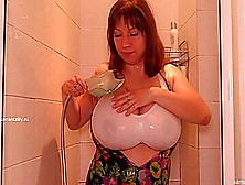 Hot Smiley Mature Soaping Big Tits In The Bathroom
