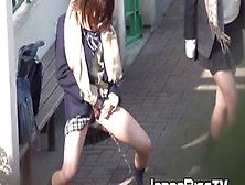 Japanese Babe And Her Friend Piss Together Out In Public