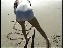 White Chick Vs Black Snake On The Beach