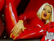 Blonde In Red Latex Suit Fingers Herself - Brittany Andrews