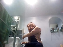 Sexy Milf Looking Around When Pissing On The Toilet
