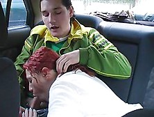Red-Haired Doxy Engulfing In The Car For All To Watch
