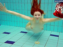 Polish Redhead Swimming In The Pool