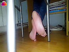 Gorgeous Bare Feet In Jeans Under Chair