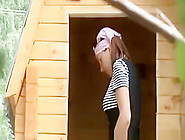 Lady Pees In Wooden Cabin