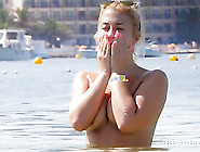 Pierced Nipple Girl Swimming At A Topless Beach