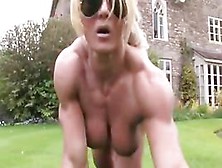 Muscle Goddess Dildoing Her Pussy In The Garden