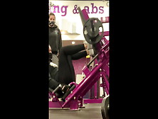 Fat Hispanic Legg Press At Gym