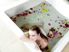 Scarlett Sage Satisfies Pussy In The Bathtub With Flowers
