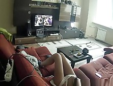 Chick Masturbating In The Couch While Watching Porn