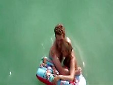 Topless Chick With Small Tits In The Water