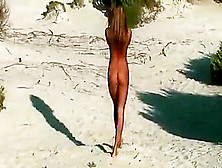 Blonde Nude Walk On Beach
