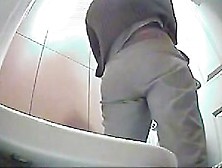 Great Footage With Peeing Woman In A Bathroom