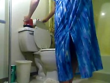 Granny Smoking While Shitting In Toilet