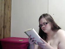 Nerdy Pregnant Girl Reading Naked In Bed