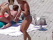 Blonde Teen Sunbathing By The Pool
