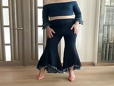 Crossdresser Gay Tranny In Wide Leg Bootcut Flare Jeans And Crop Top And High Heels Dancing For His Master And Mistress