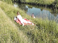 Riverside Nude Cougar Sunbathing Is Not Shy About Random Fisher.  Outside.  Wild