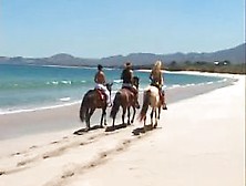 Katy & Delfynn Threesome On The Beach