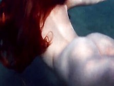 Enjoy A Red Head Underwater And Lesbians