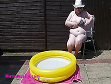 Older With Monstrous Breasts In The Smallest Bikini By The Pool