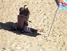 Hidden Cam Scene With A Couple Banging In The Cowgirl Pose On A Beach