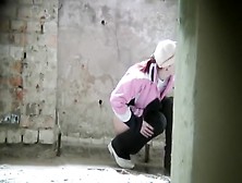 Sporty Girl Pissed In The Old Building Ruins