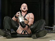 Bald Dude In Leather Pants Playing With A Sybian