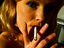 Chick Smokes Her Cigarette In The Nude