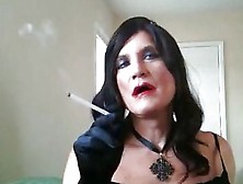 Fugly Mature Tranny Takes A Smoke And Plays With Dildo