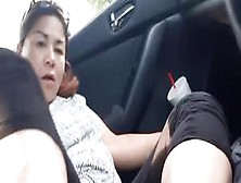 Mature Korean Lady Giving Black Guy Footjob In Car