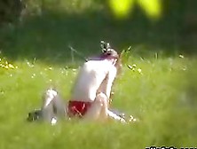 Horny Naked Couple In The Park Exposed By A Passerby