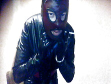 Latexpeti Wear Latex Catsuit, Gloves And Smoking