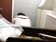 Female Bent Over The Bowl And Shot On The Toilet Cam