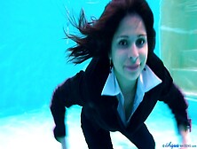 Woman Underwater In Suit