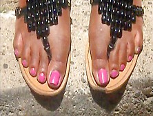 Wonderful Ebony Chick Wearing Flip Flops On Her Sexy Black Feet Outdoors