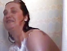 Sandra Taking A Shower And Shaving Her Twat