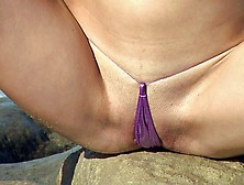 Slim Female In Her Purple Bikini Rubbing On Her Little Clit