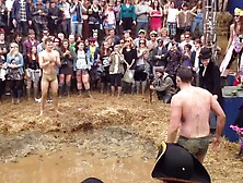 Naked Guy Strips Another Guy In Mud Fight
