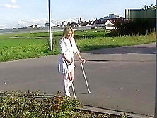 Slc And White High Heel Pump Outdoor On Crutches