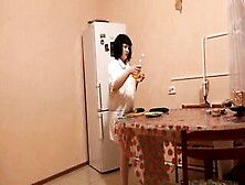 Long Cucumber Fucks Bald Vagina Into Oil.  A Dark Hair With A Gorgeous Butt And Into Pantyhose Masturbates Inside The Kitchen On