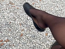 Shoe Dangling Outdoors In Stockings