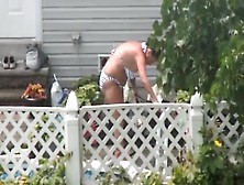 Spying On A Striped Bikini Milf