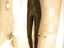 Latex Catsuit In The Shower