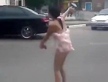 Drunk Girl Shows Off In The Evening On The Streets