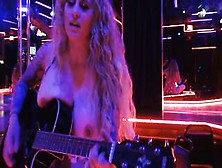 Having Fun Guitar And Singing A Cover Topless Into Club