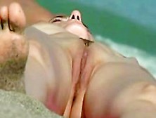 Superb Voyeur Beach Video Of A Trimmed Pussy Tanning