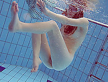 Solo Model With The Red Hair Decides To Get Naked Under The Water