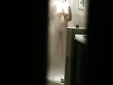 Voyeur Watches This Milf Take A Shower