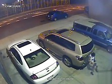 Security Camera Catches A Girl Peeing Behind A Car